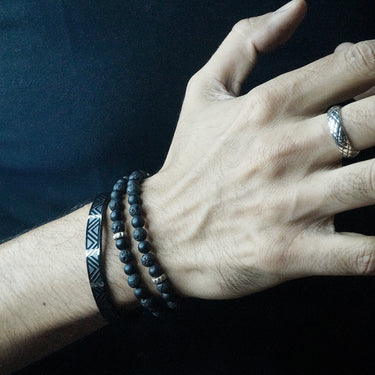 Two Layer Wrap Bracelet in Onyx Gemstone Beads with Pyramid Stoppers.